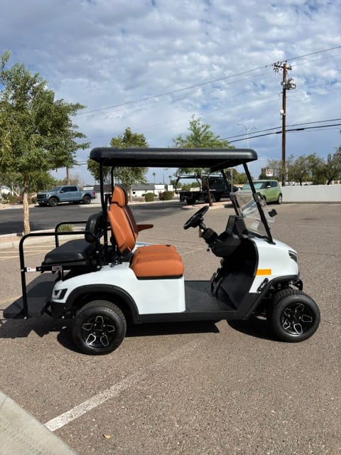 Full side profile of the white KANDI GOAT with the rear seat installed