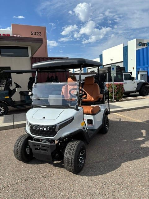 White KANDI GOAT with rear seat conversion parked at Arizona Golf Cart Repair