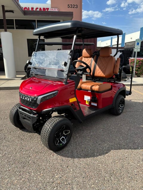 Red KANDI GOAT 2P with rear seat conversion outside the Mesa shop