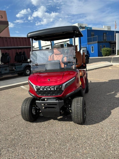 Straight-on front view of the red KANDI GOAT after conversion