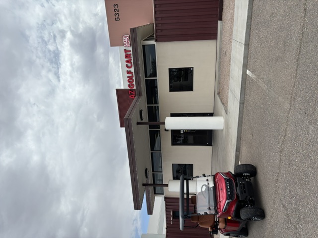 Red 2025 KANDI GOAT 2P parked outside the Arizona Golf Cart Repair Mesa shop