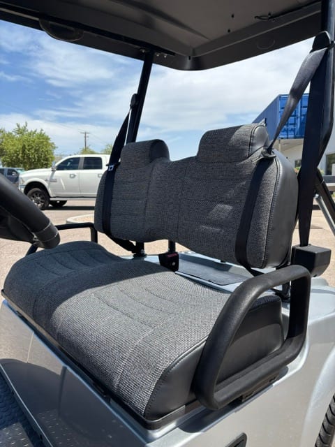 New gray cloth upholstery on the rebuilt 2018 Tomberlin bench seat