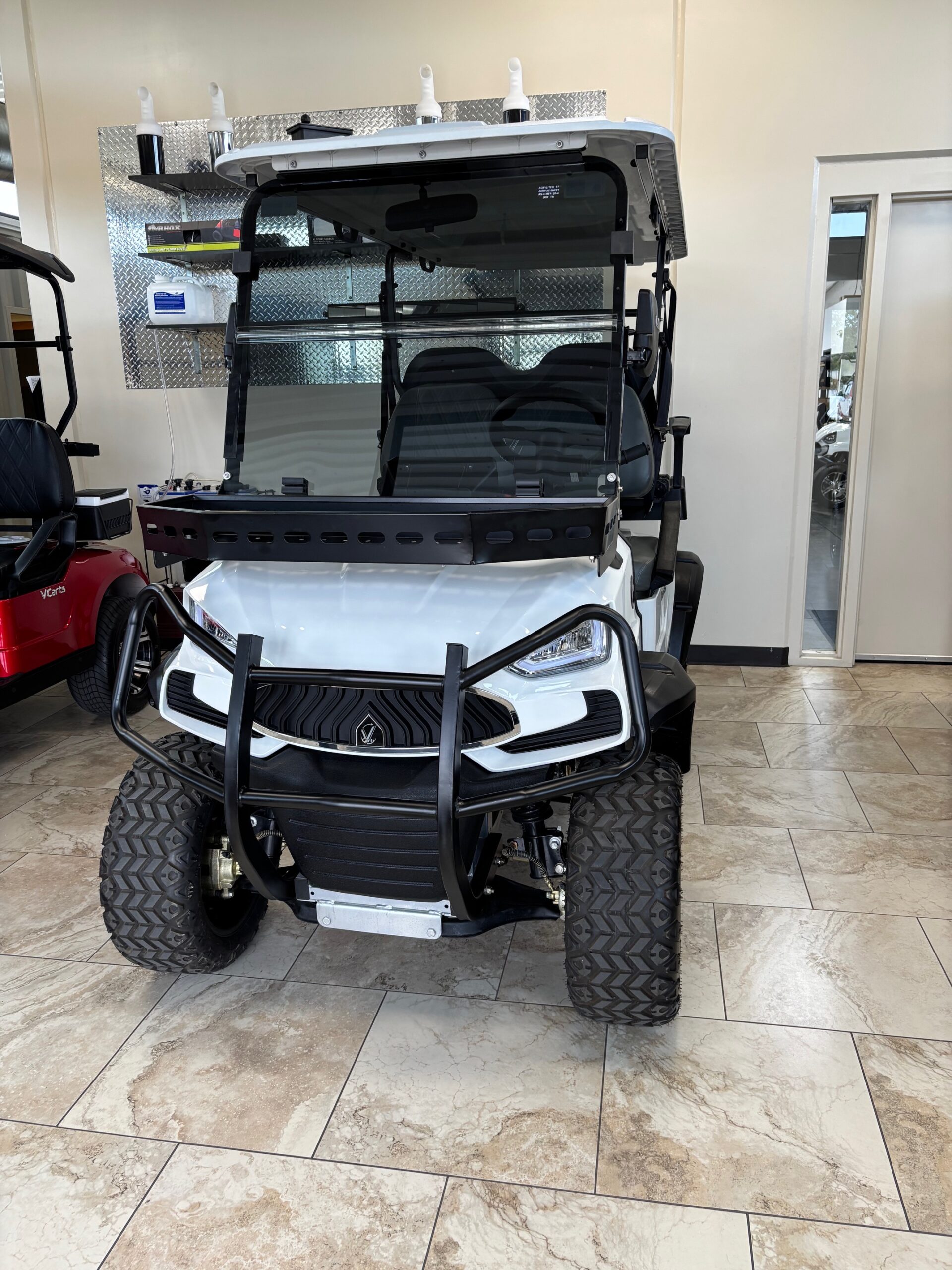 White KANDI golf cart in Arizona Golf Cart Repair showroom