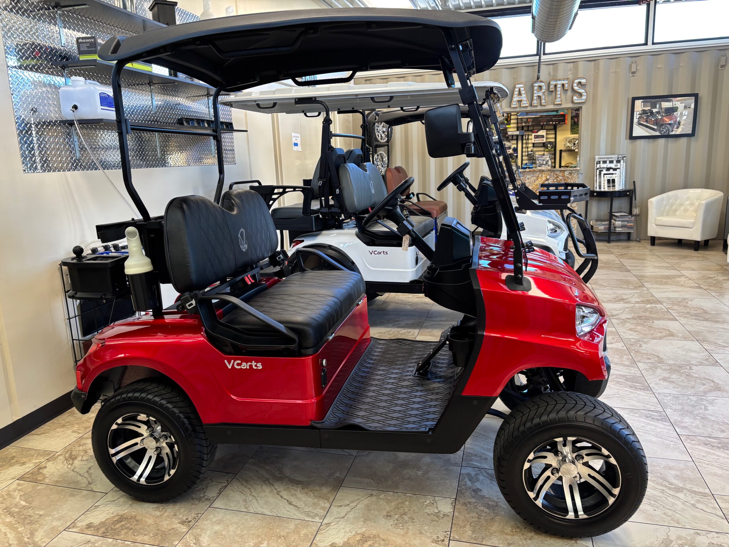 Red KANDI golf cart in Arizona Golf Cart Repair showroom