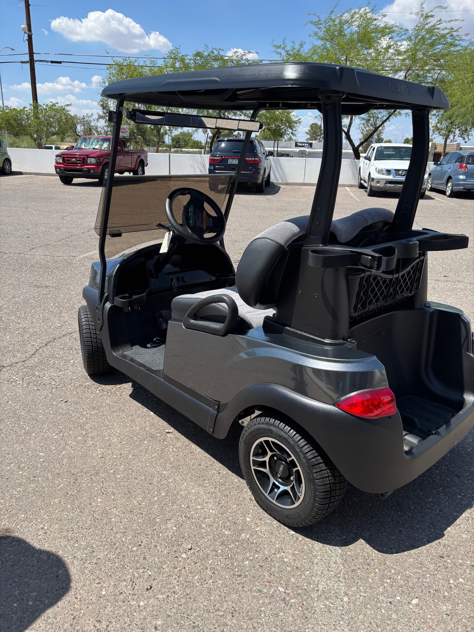 Side angle of grey golf cart inventory